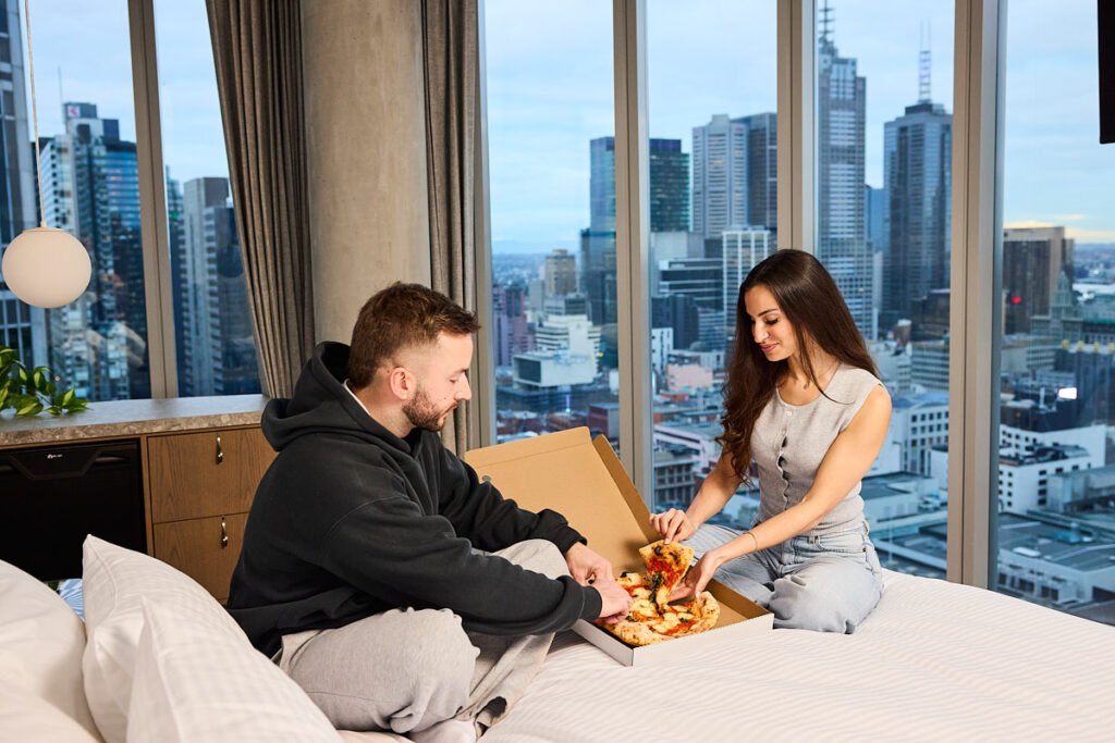 Couple sharing pizza at Brady Hotel Elizabeth Street
